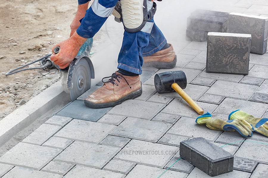 Angle Grinder cutting paving stones