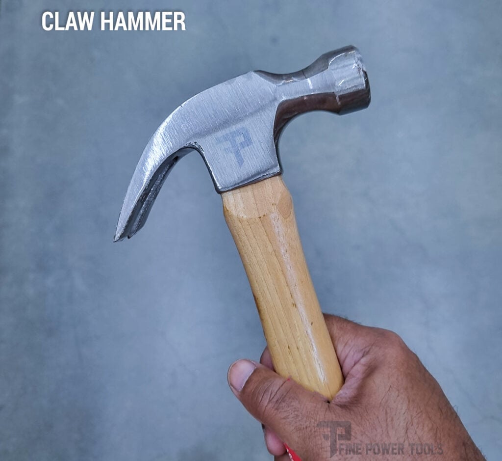 Man holding a Claw Hammer