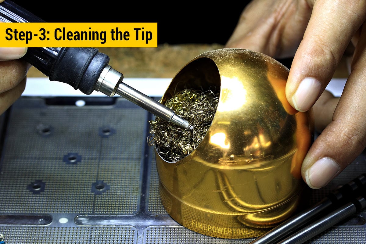 Cleaning soldering iron tip